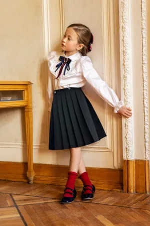 Black tartan pleated cotton skirt with gold buttons with coat of arms