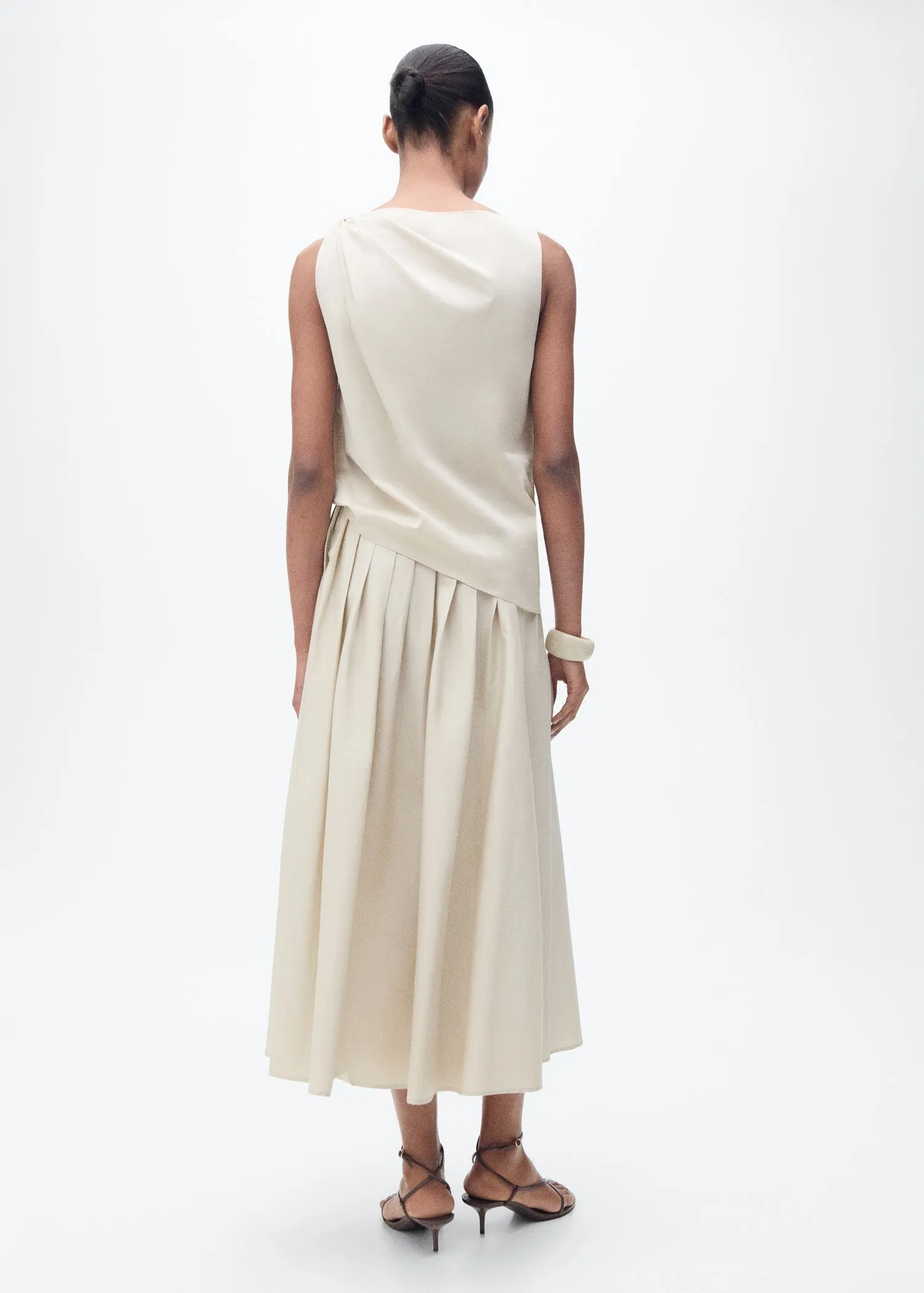 Flared skirt with pleated detail