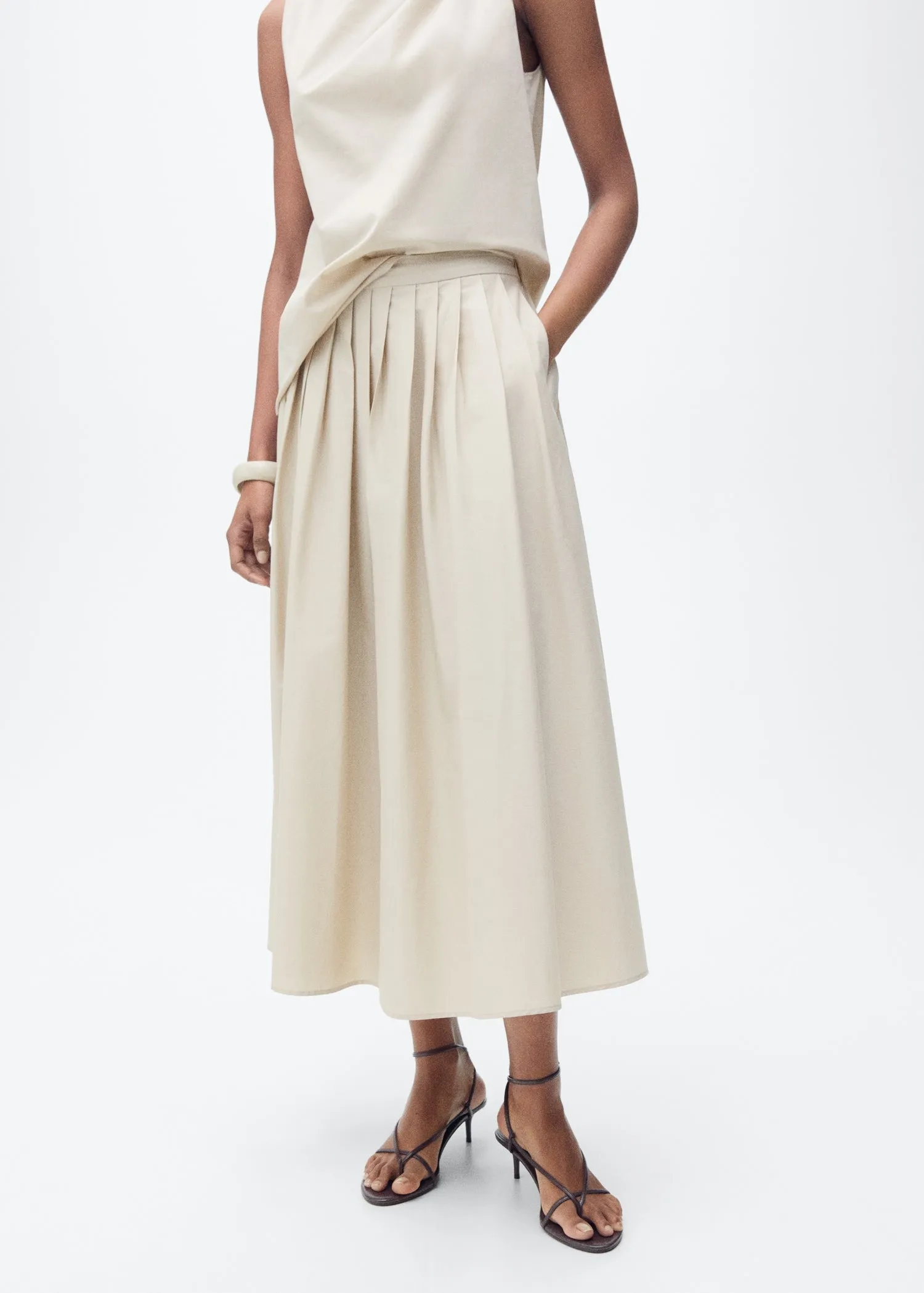 Flared skirt with pleated detail