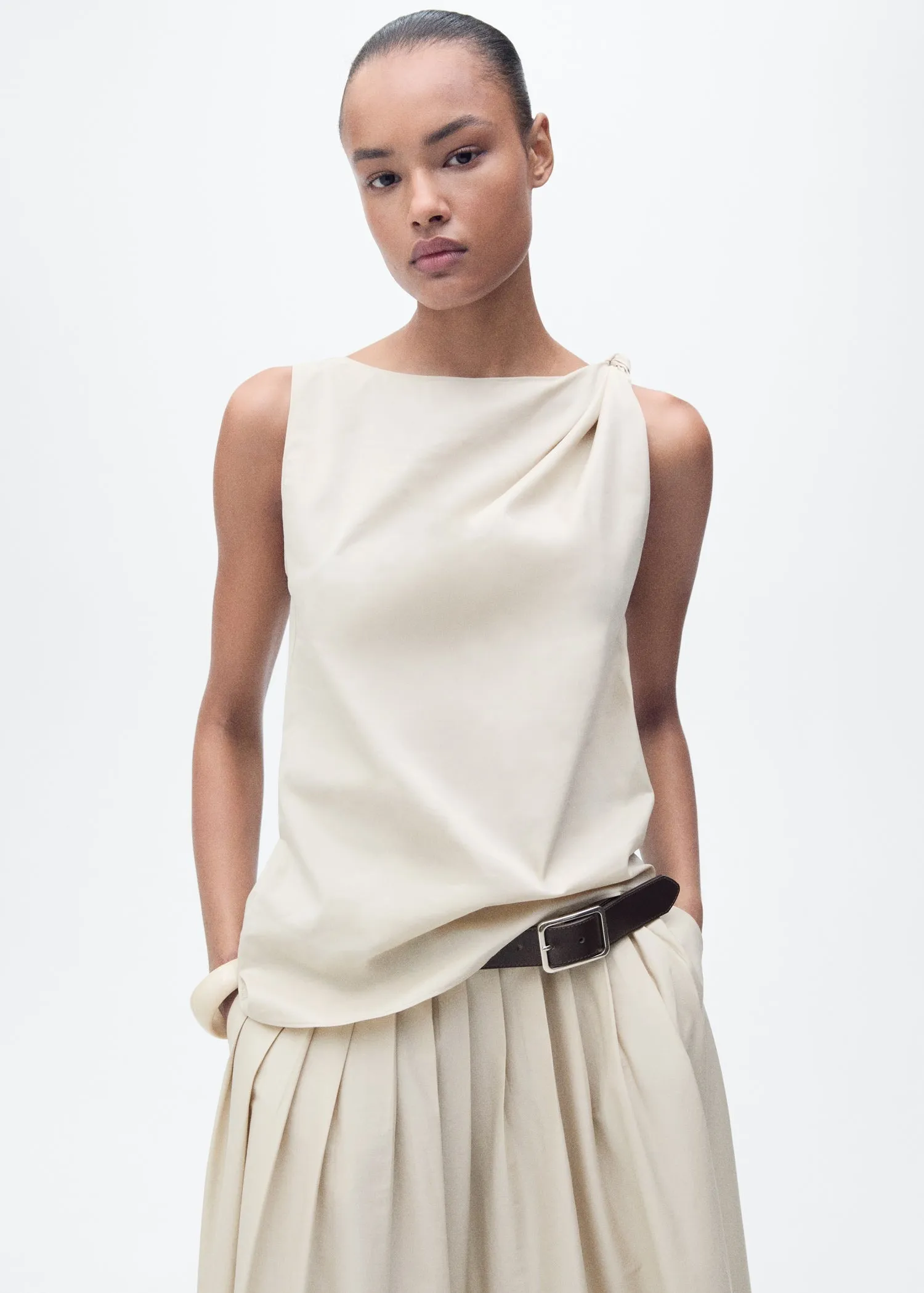 Flared skirt with pleated detail