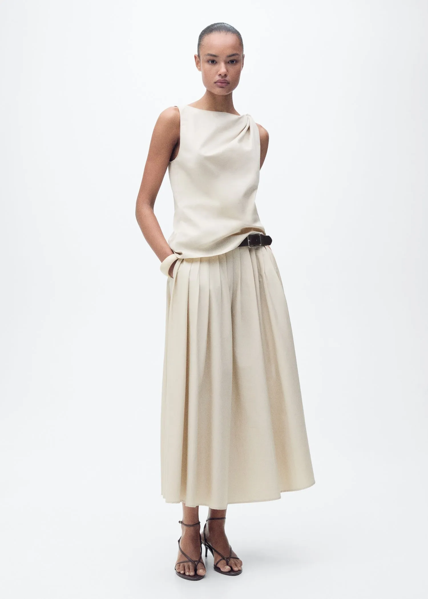 Flared skirt with pleated detail