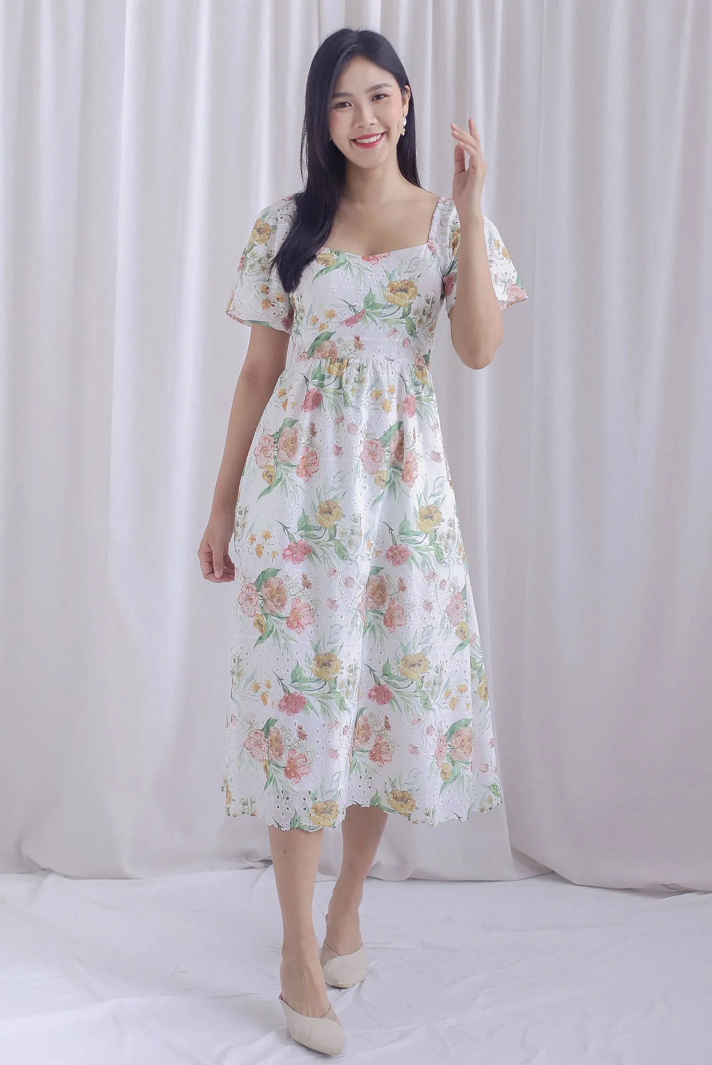 Madeleine Floral Print Eyelet Sleeved Dress In Pink