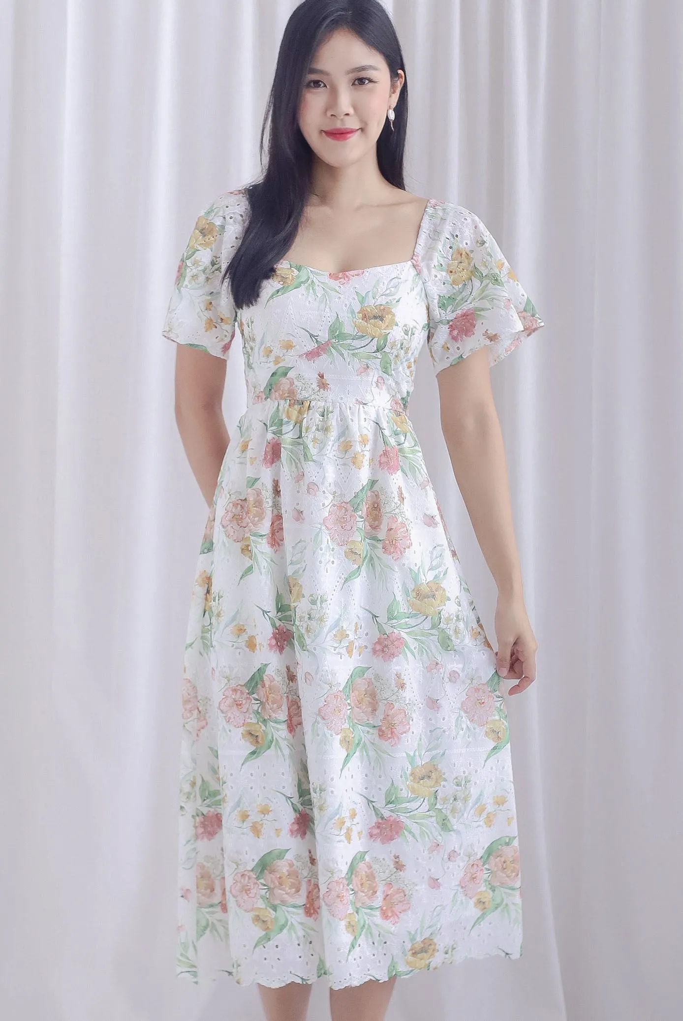 Madeleine Floral Print Eyelet Sleeved Dress In Pink