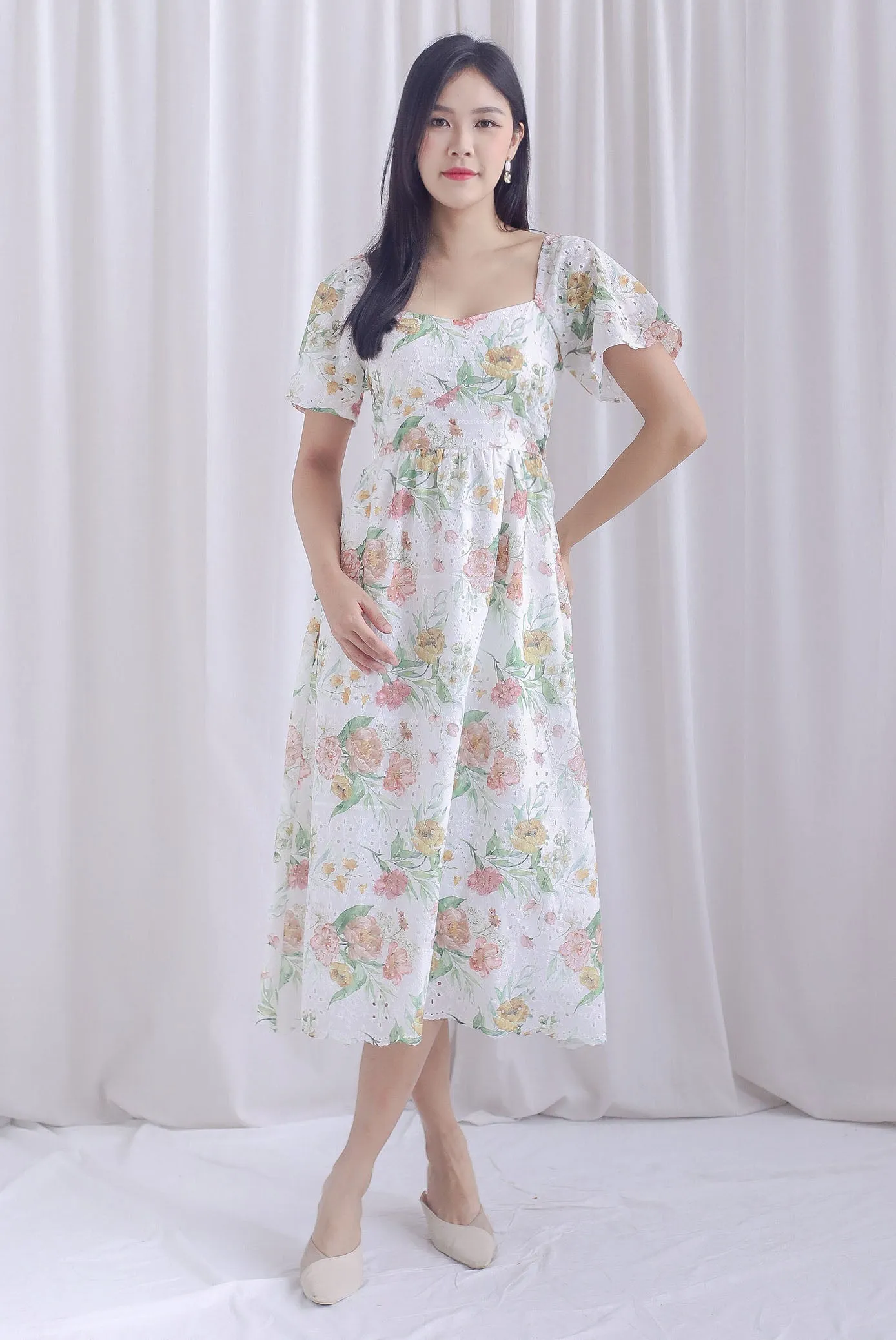 Madeleine Floral Print Eyelet Sleeved Dress In Pink