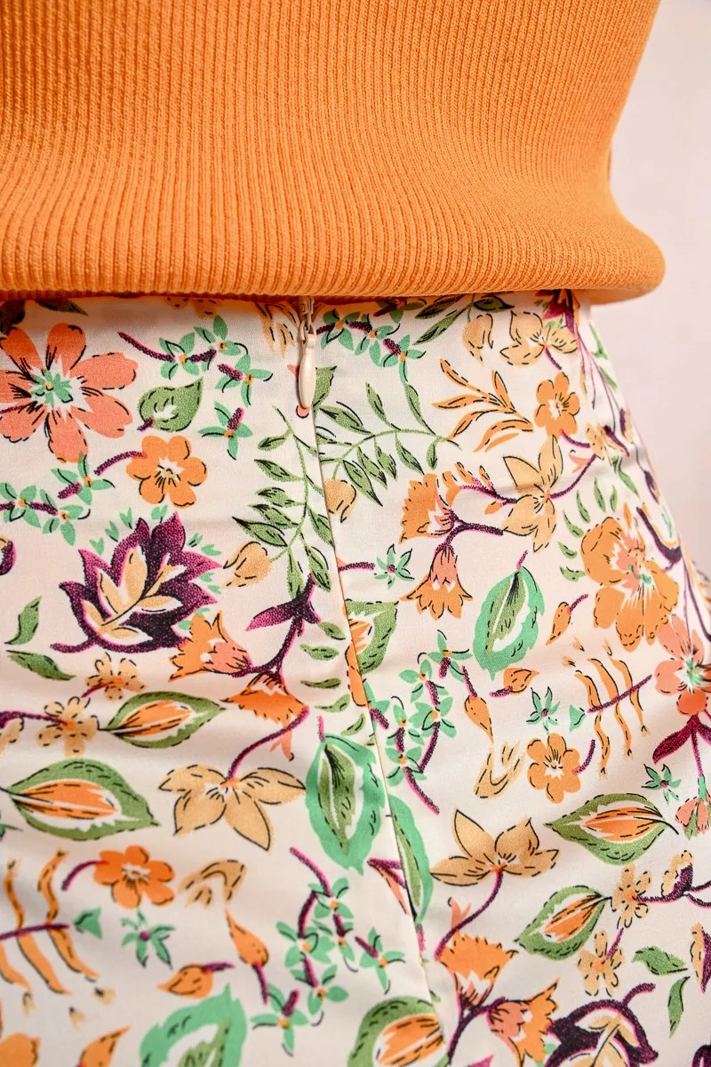 PRINTED WRAP MINI SKIRT