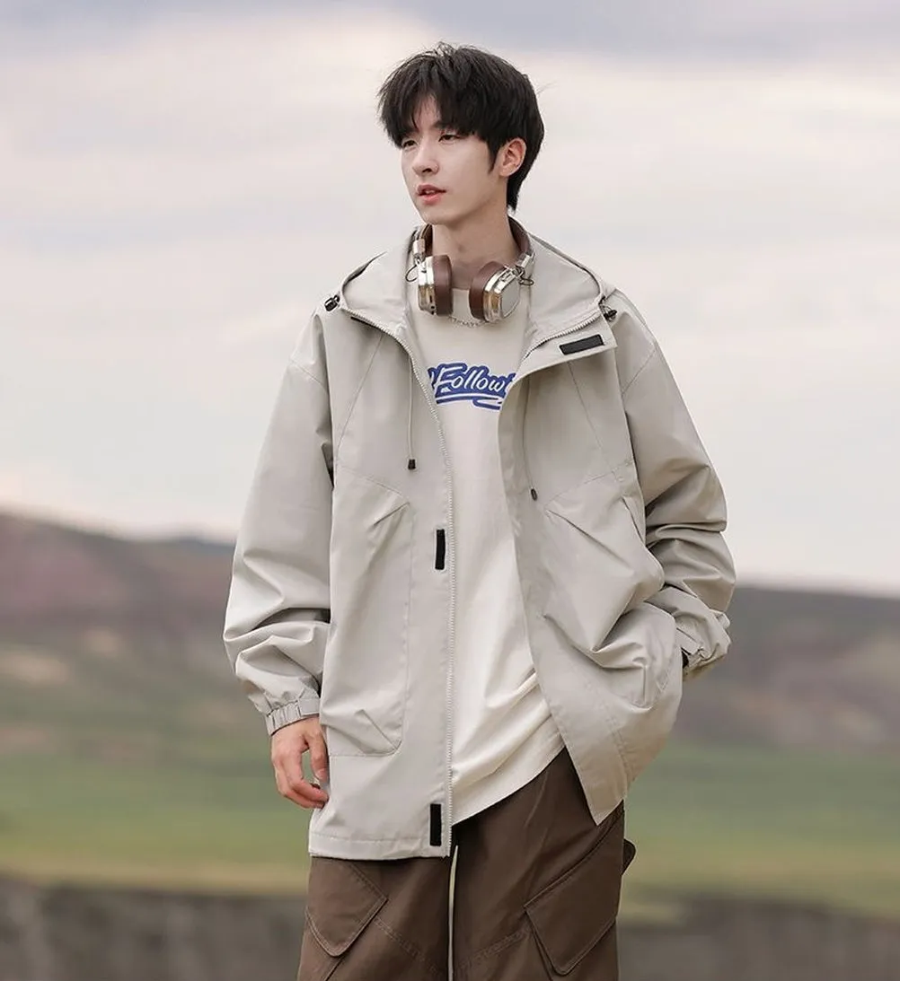 Solid Stain-resistant Relaxed-fit Raincoat for Outdoor Adventures