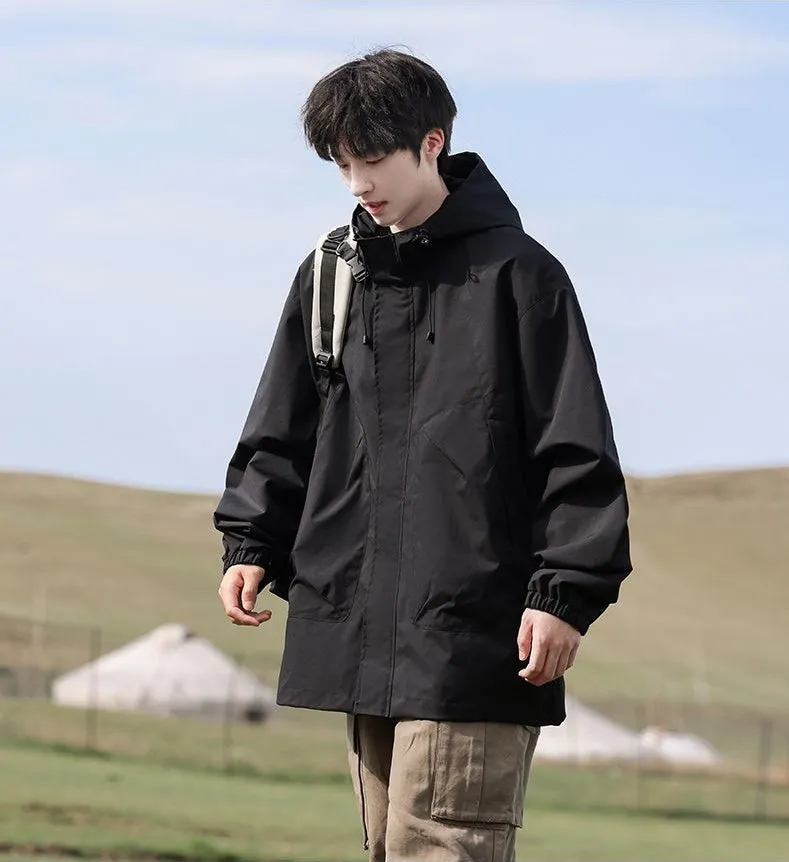 Solid Stain-resistant Relaxed-fit Raincoat for Outdoor Adventures